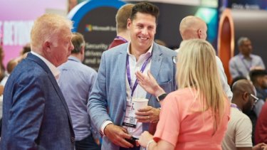  Infosecurity Europe attendees network on the exhibition floor
