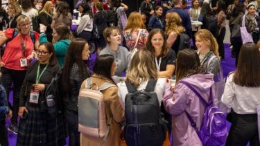  Infosecurity Europe attendees network on the exhibition floor