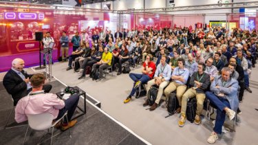 Rows of attendees watch a Talking Tactics conference session at Infosecurity Europe