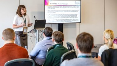 Infosecurity Europe speaker and attendees in a session