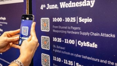 A mobile phone scanning QR code