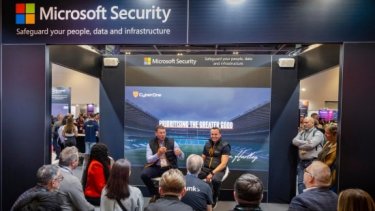 Speakers and attendees at Microsoft Security stand