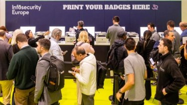 Cybersecurity Professionals Check In at Infosecurity Europe Registration Desks