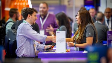 Infosecurity Europe attendees networking 