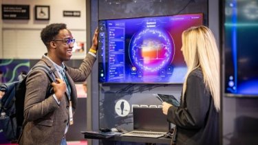 Infosecurity Europe attendees networking 